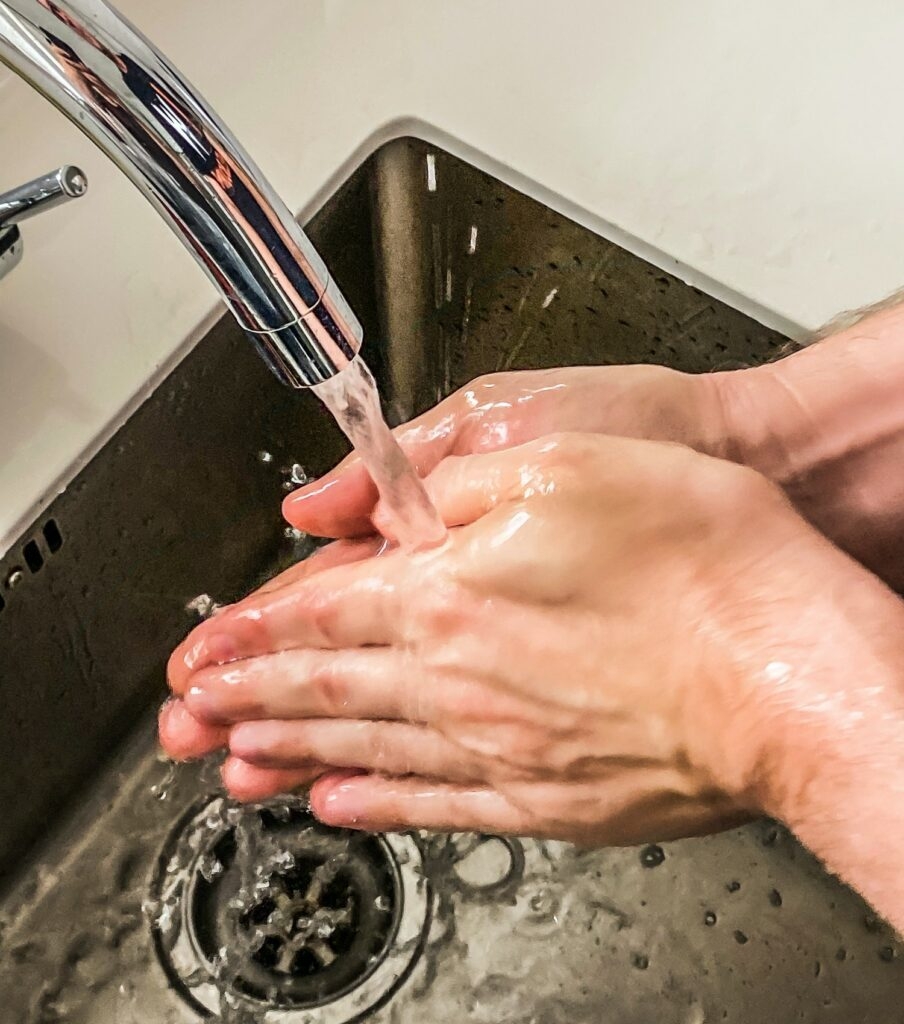 Washing hands.